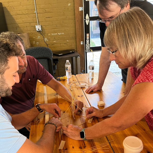 Image of Penta Software team members enjoying annual meeting activities.